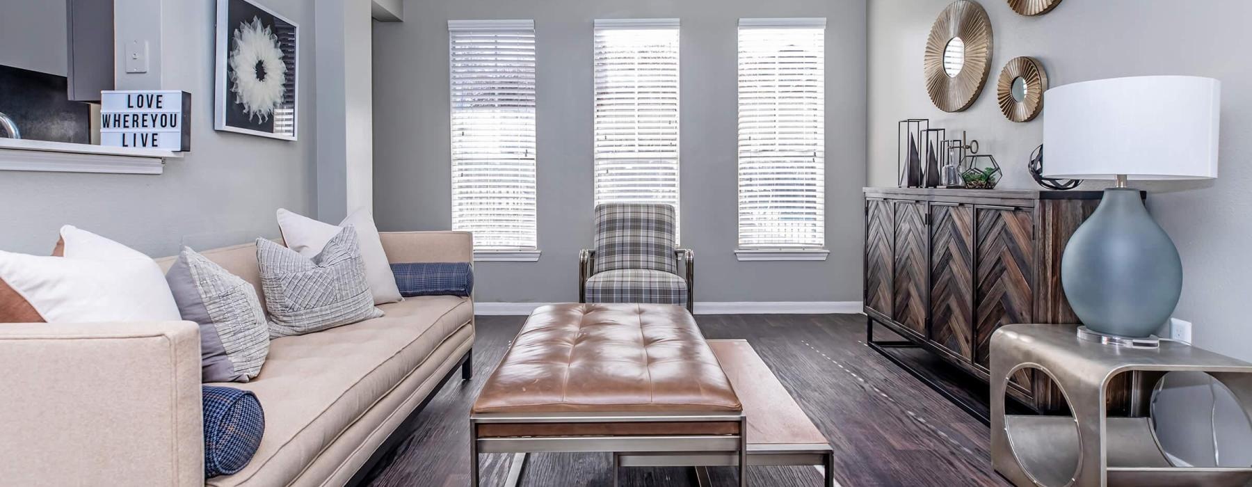 a living room with a couch and a table