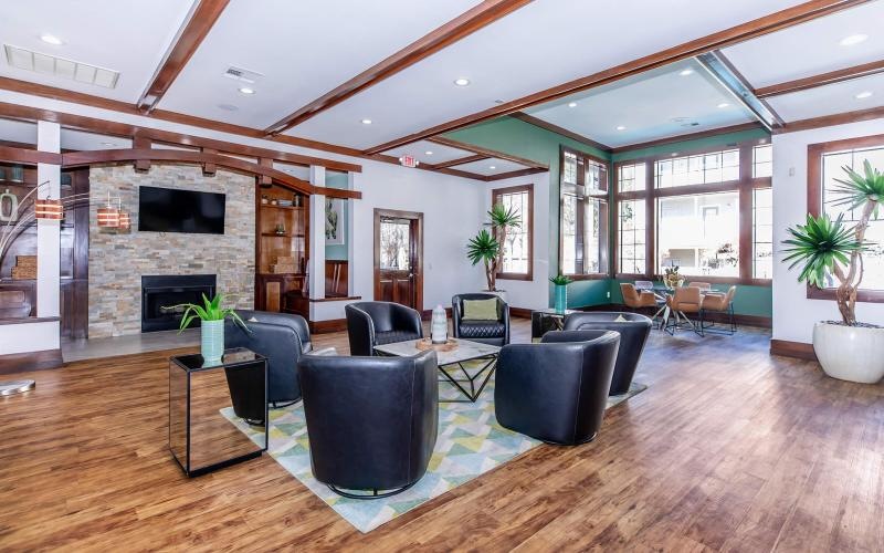 a spacious room with a fireplace