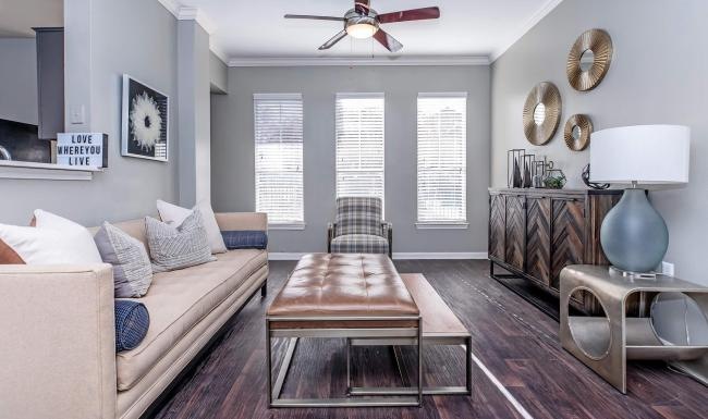 a living room with a couch and a table